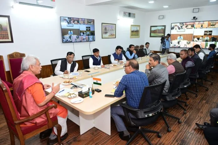 Lt-Governor-Manoj-Sinha-chairing-a-meeting-with-Civil-Administration-SASB-and-Police-officials-1-696×463-1